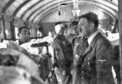 Adolf Hitler talking to wounded German soldiers in a sickbay near the eastern front in Poland